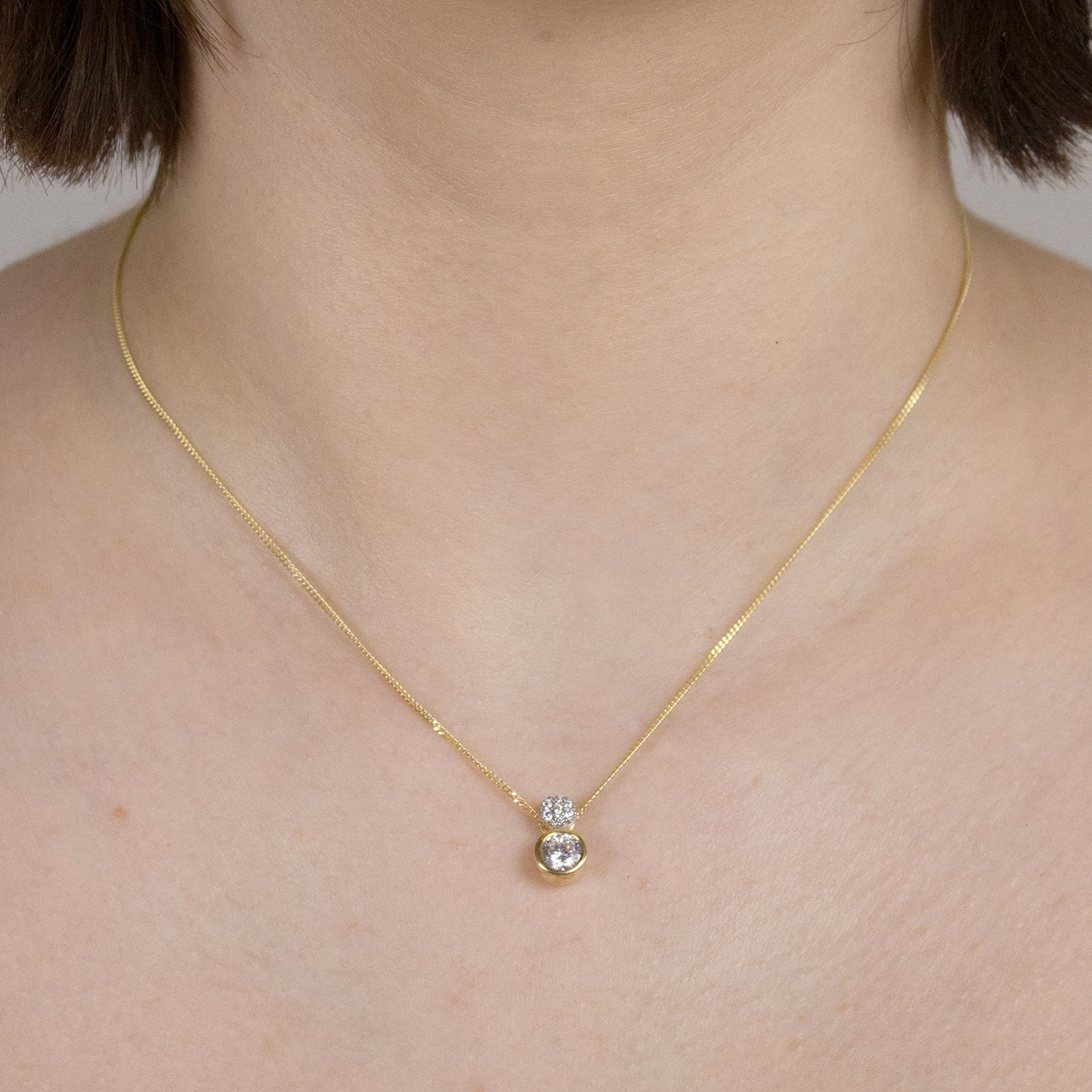 Anhänger Zirkonia  333 Gold rhodiniert mit vergoldeter Silberkette