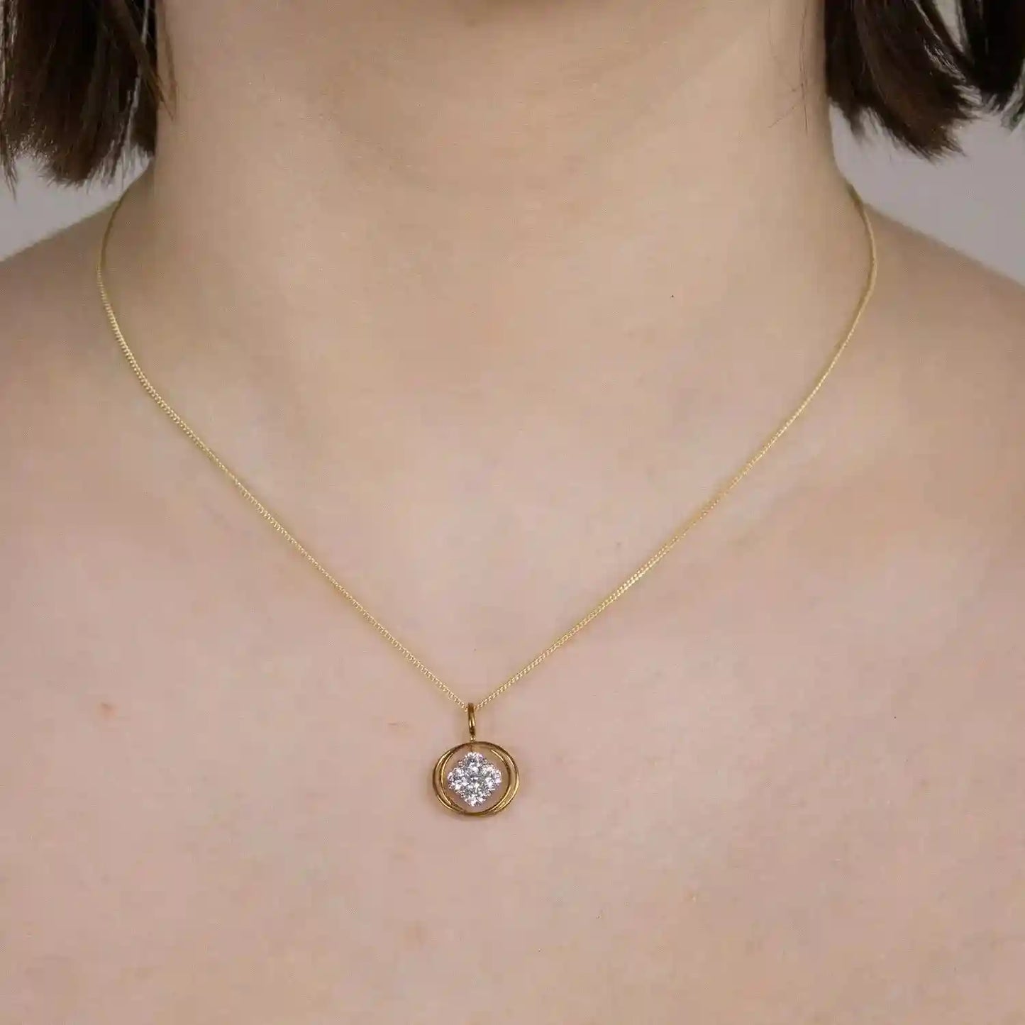 Anhänger Zirkonia  333 Gold rhodiniert mit vergoldeter Silberkette